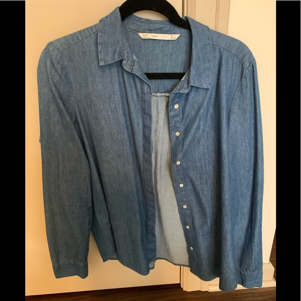 Denim blouse with detailing in the back